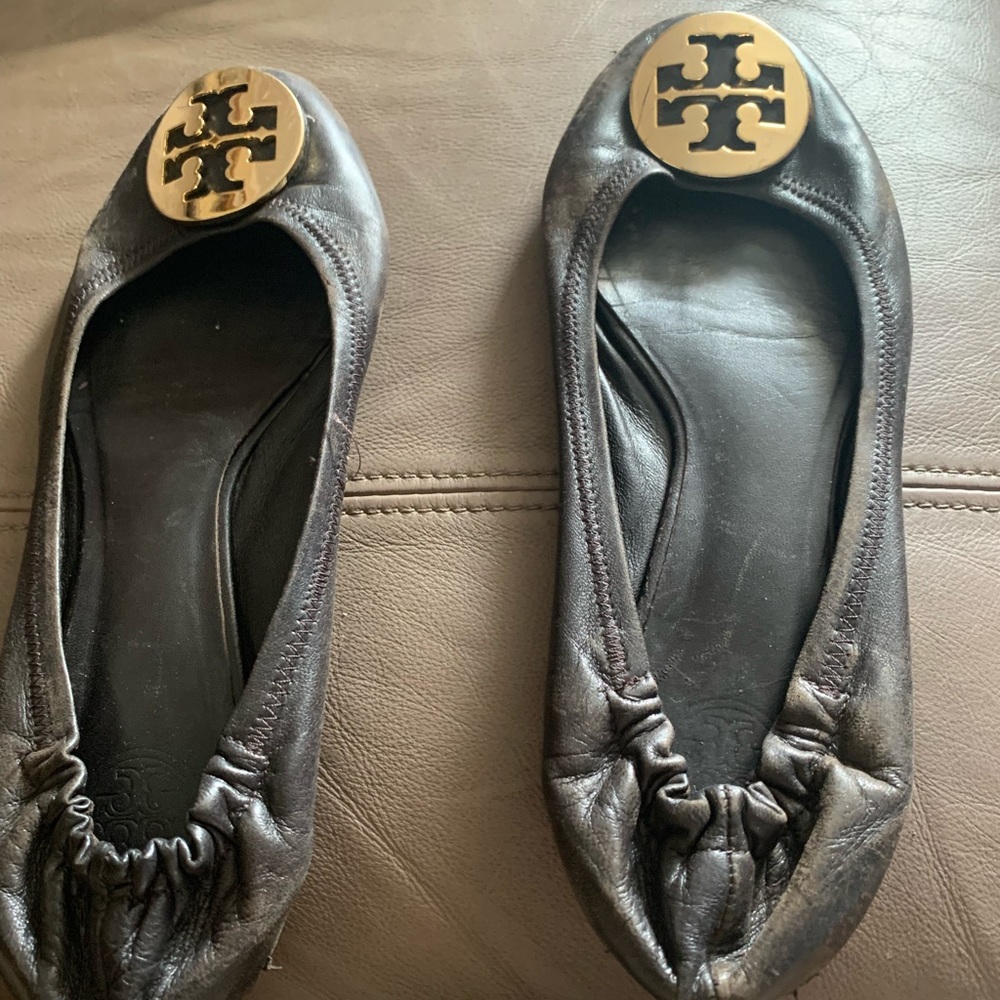Tory Burch Brown Flats with Gold Emblem For Sale.